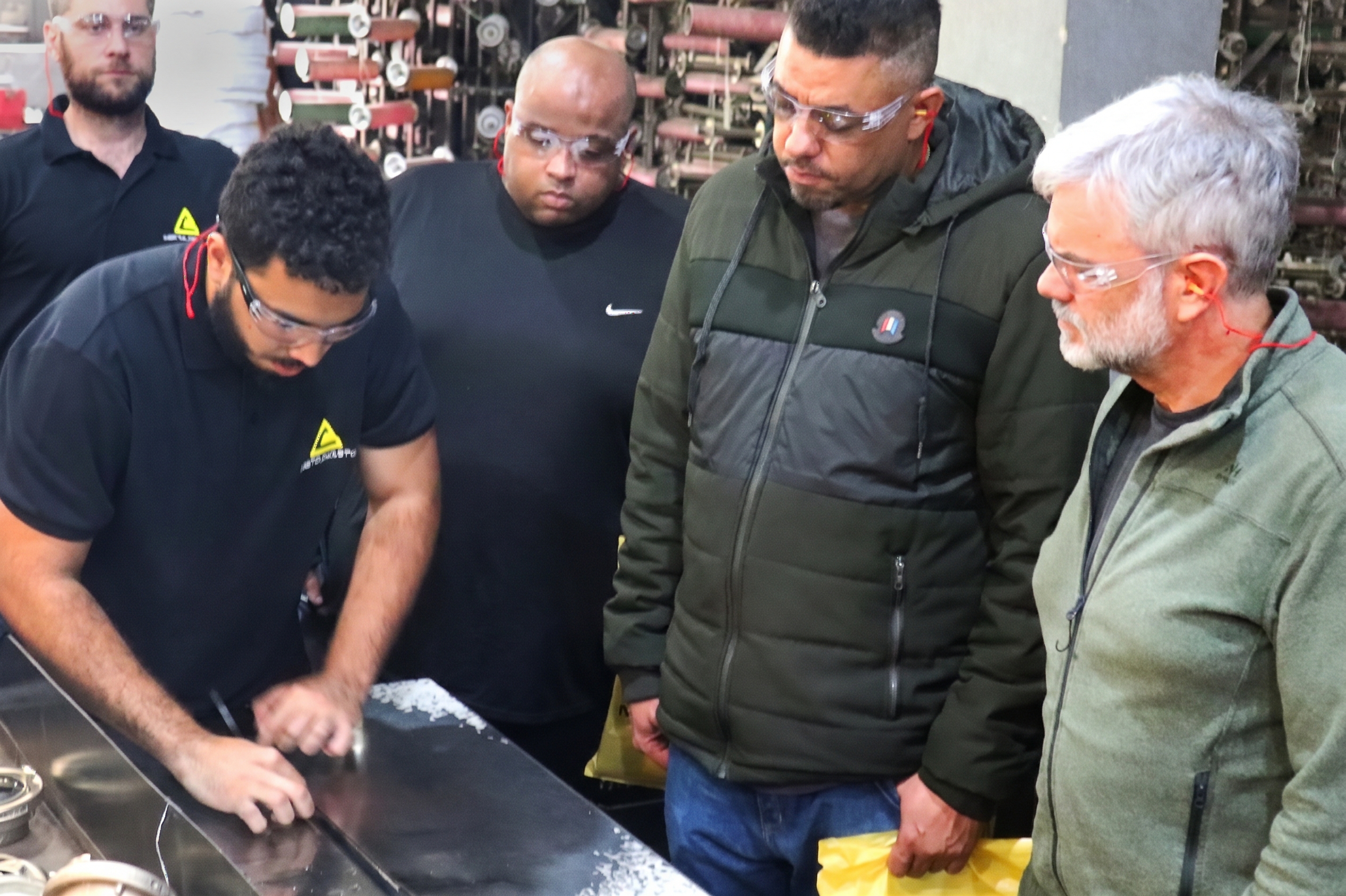 Equipe técnica da Metalcasty reunida no Workshop Fabril